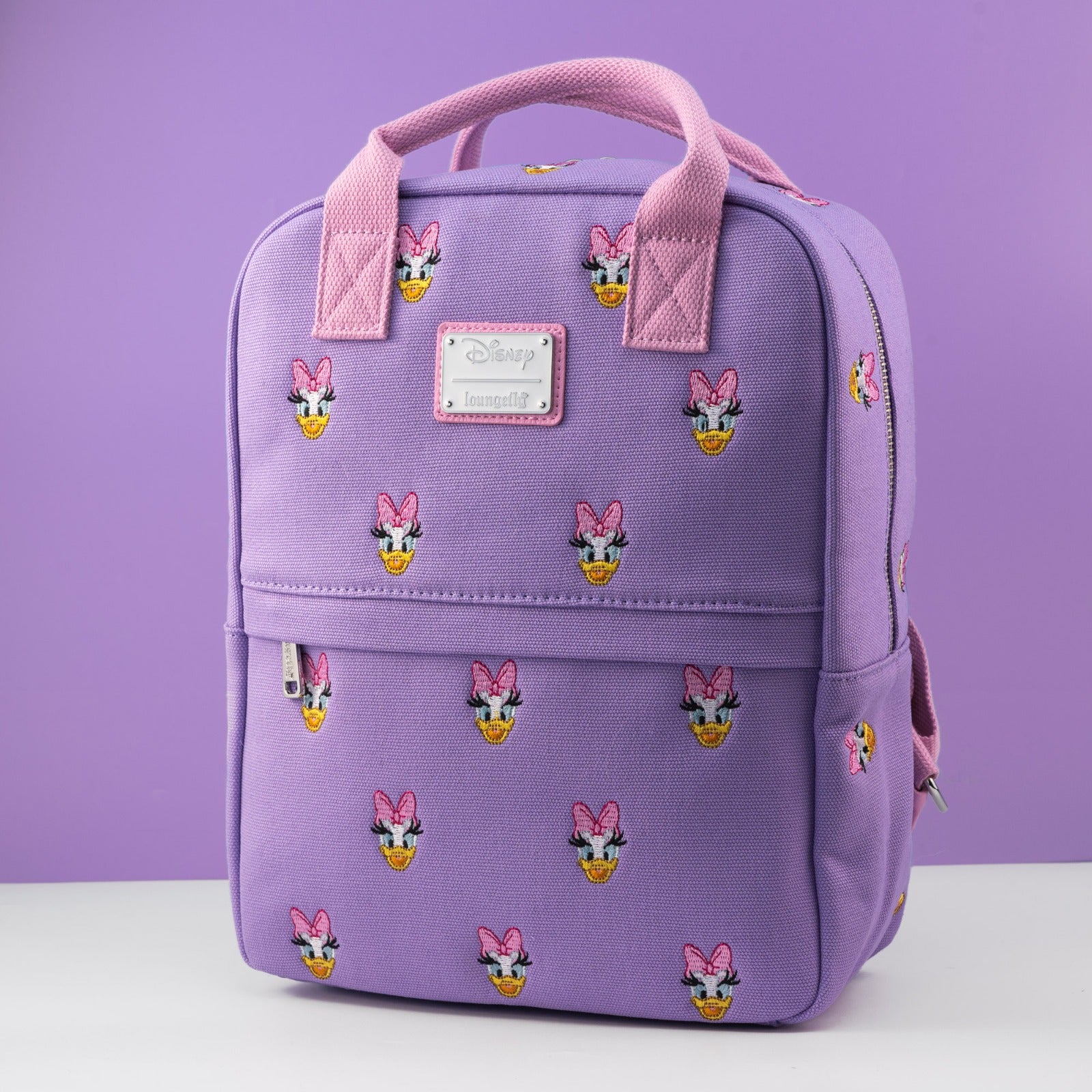 daisy duck mini backpack by loungefly Loungefly x Disney Daisy Duck AOP Canvas Backpack – GeekCore