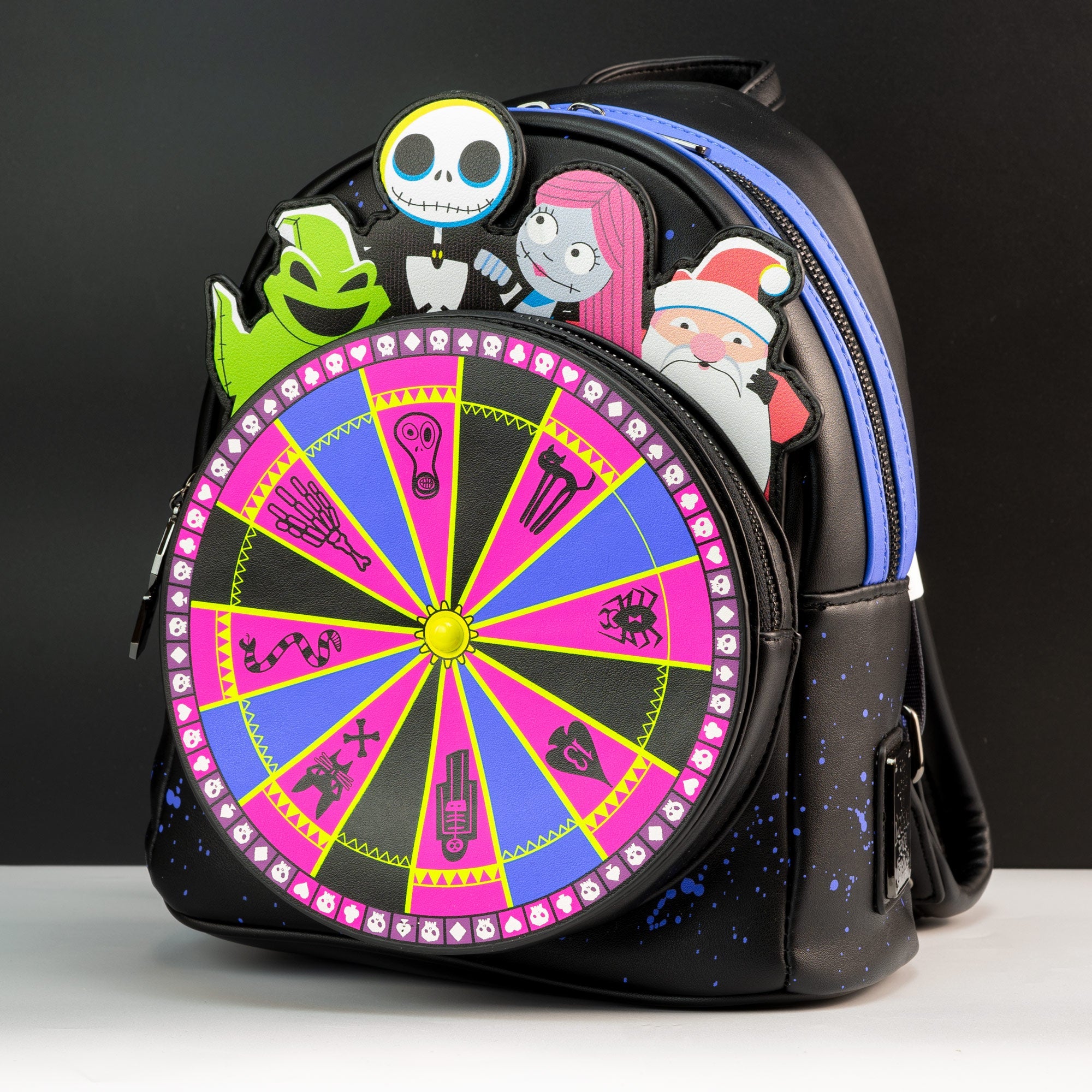 disney the nightmare before christmas oogie boogie wheel mini backpack Grotto Treasures Exclusive The Mini Backpack is made from premium vegan leather and measures approximately at 9 Width Disney Loungefly The Nightmare Before