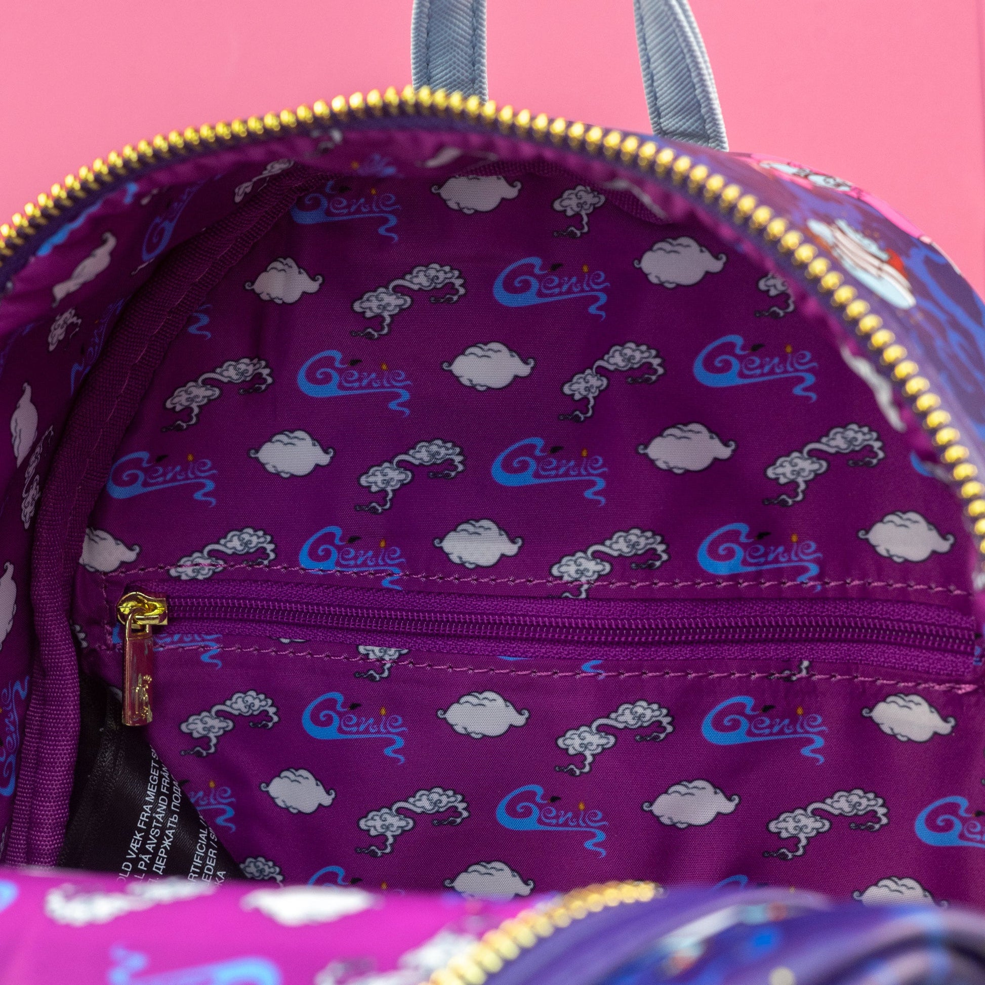 disney genie mini backpack by loungefly aladdin Loungefly x Disney Aladdin The Genie Transformations AOP Mini Backpack – GeekCore
