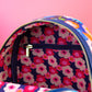 Loungefly x Disney Alice in Wonderland Characters AOP Mini Backpack (LASR) - GeekCore