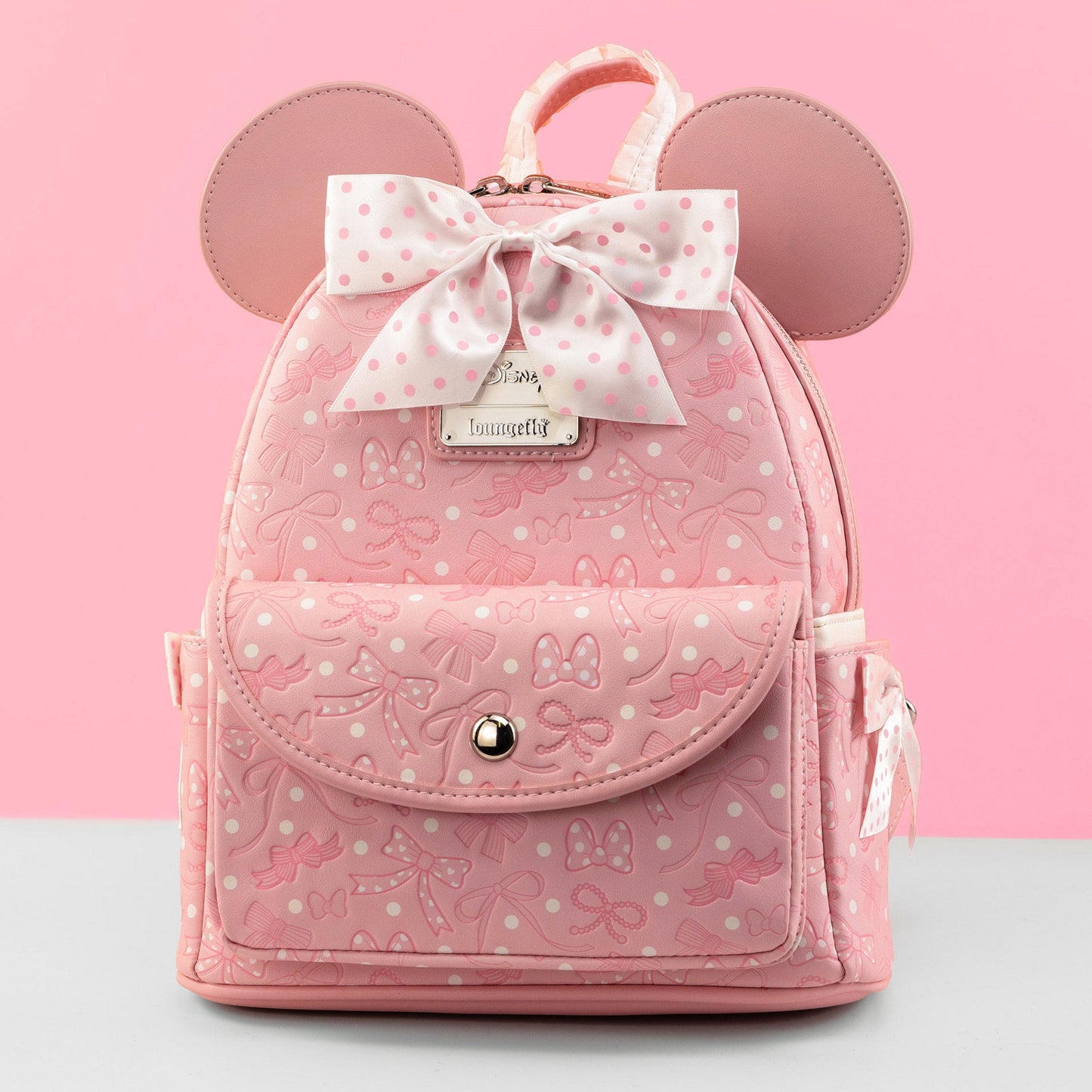 Loungefly x Disney Minnie Mouse Pink Debossed Bows Mini Backpack - GeekCore