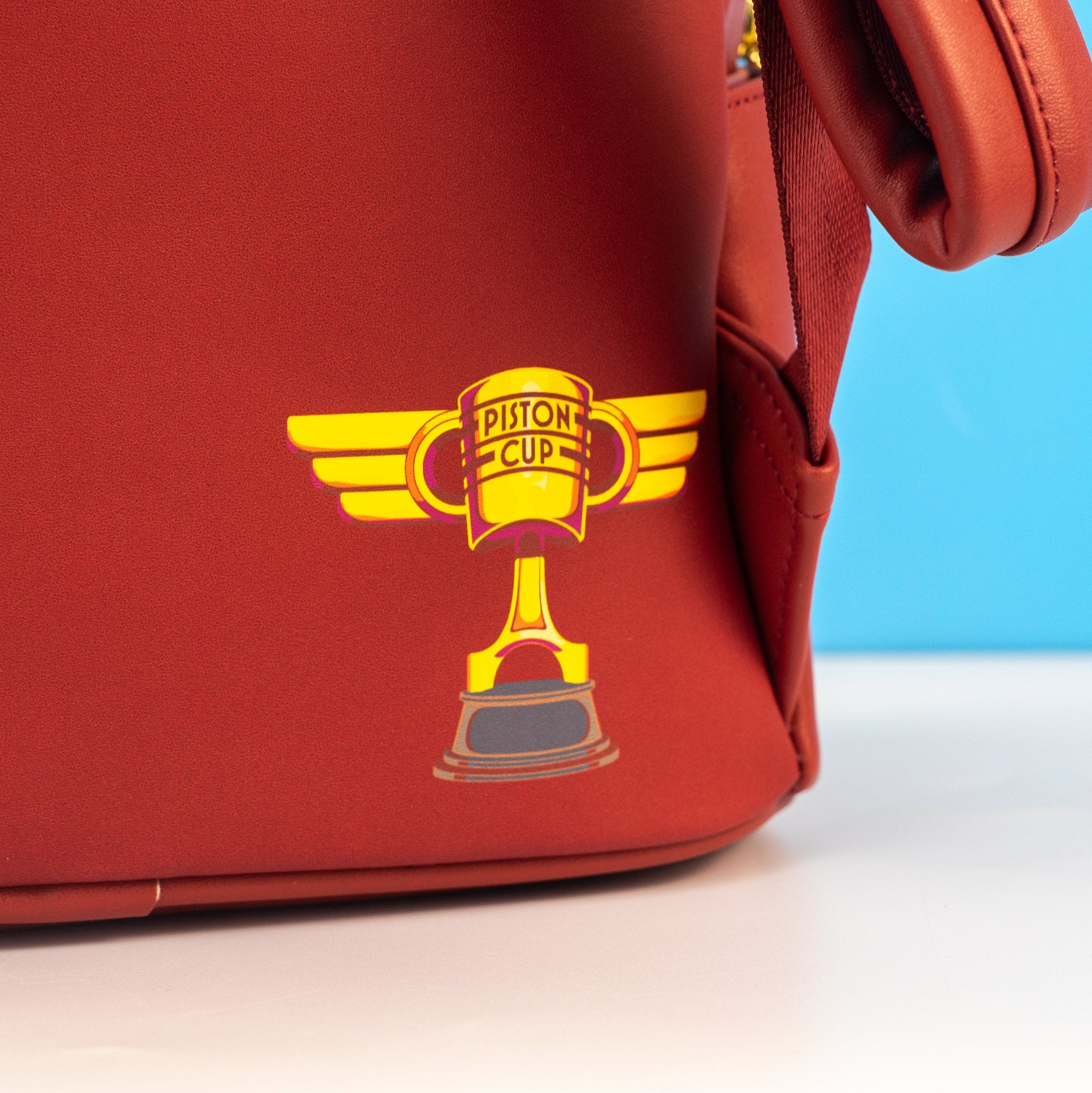 Loungefly x Disney Pixar Cars Lightining McQueen Radiator Springs Mini Backpack - GeekCore