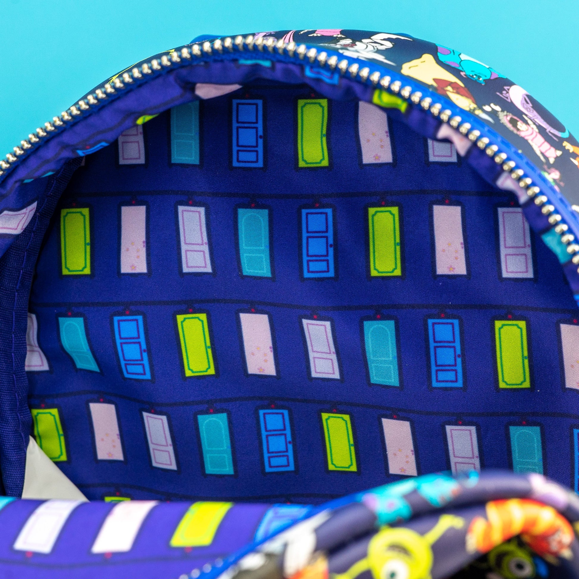 aop monsters inc bag Loungefly x Disney Pixar Monsters Inc AOP Mini Backpack – GeekCore
