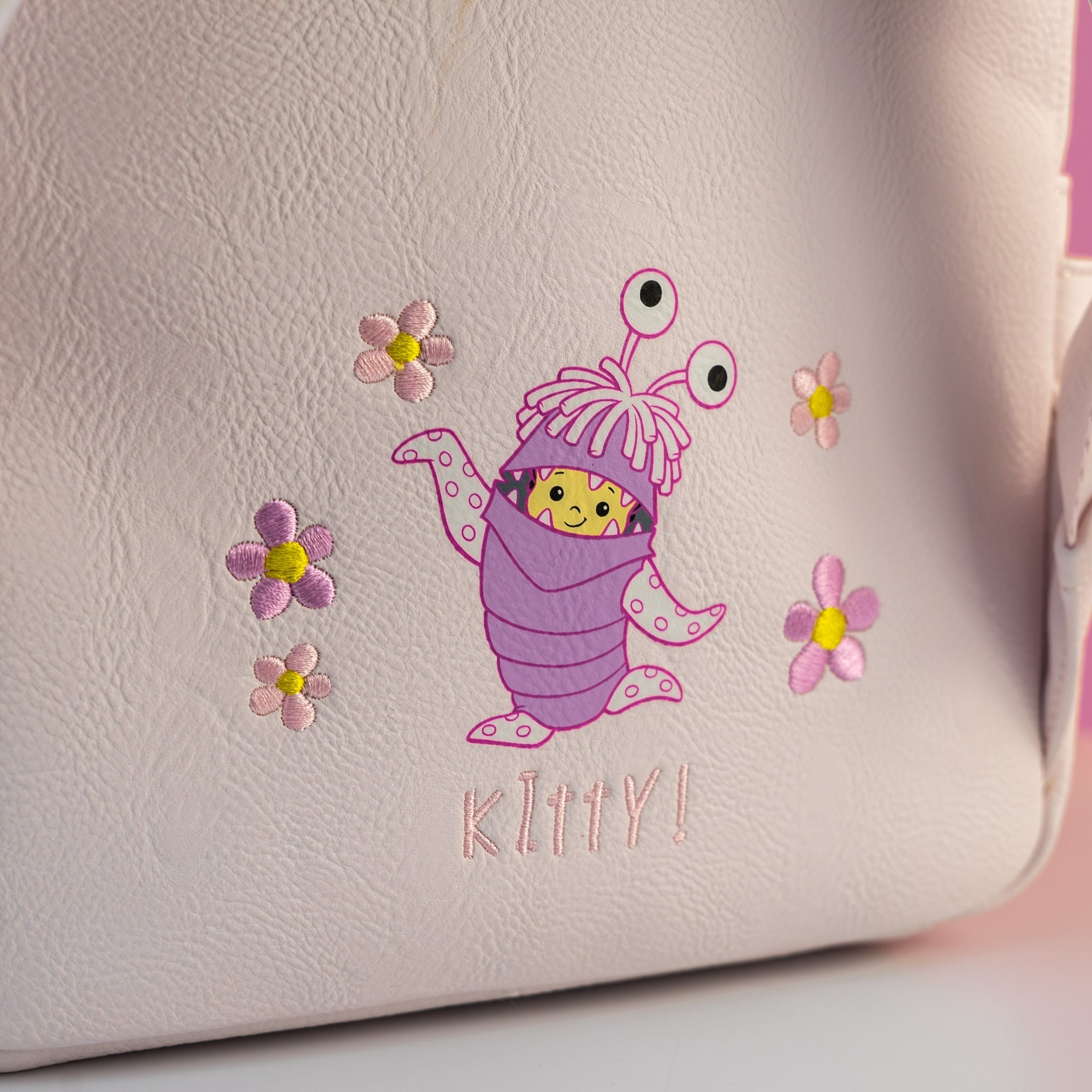 Loungefly x Disney Pixar Monsters Inc Light Up Boo's Door Mini Backpac ...