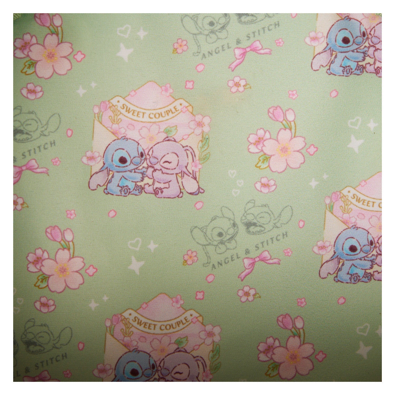 Loungefly x Disney Stitch Cherry Blossom Bow Handle Crossbody Bag - GeekCore