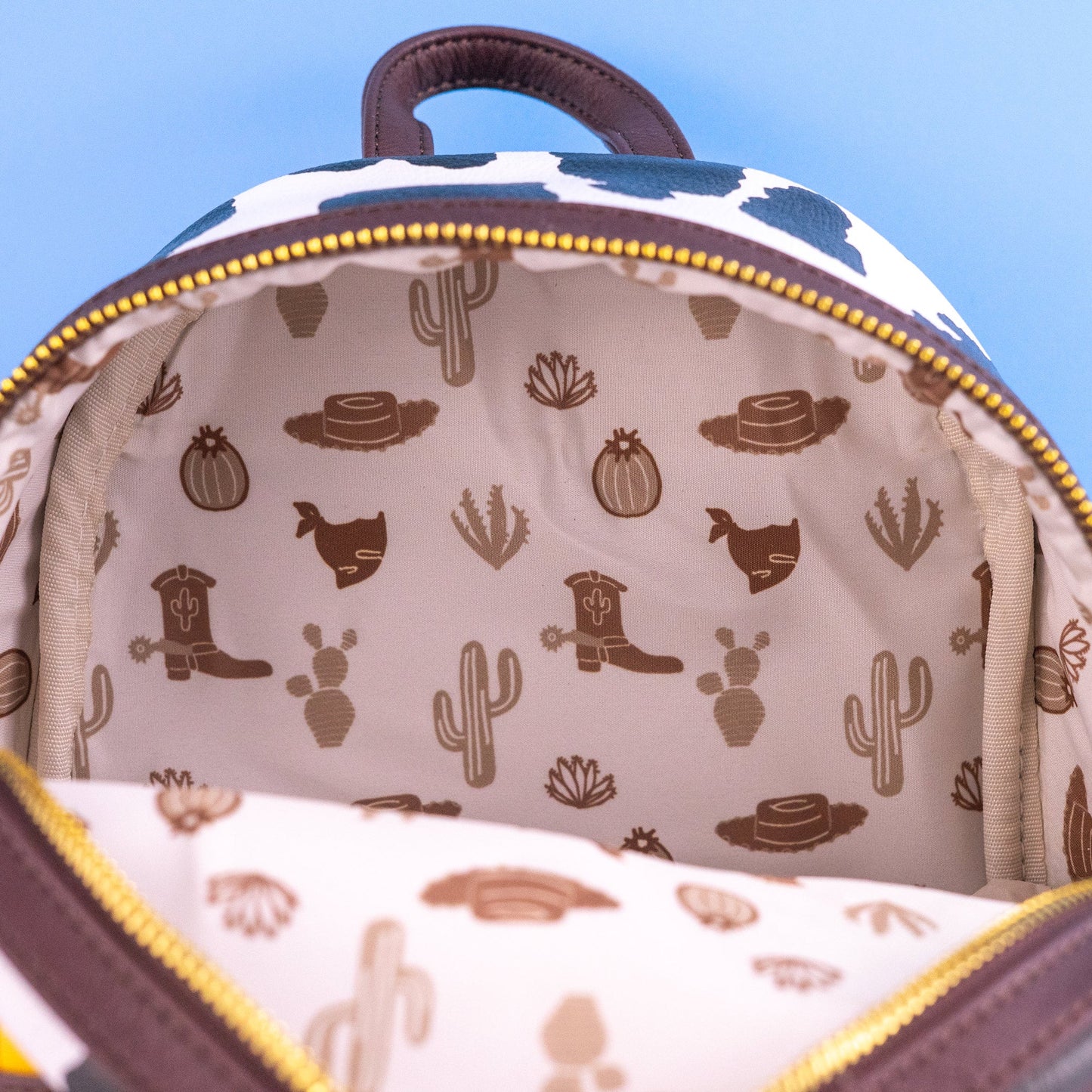 Loungefly x Pixar Woody Cosplay Mini Backpack - GeekCore